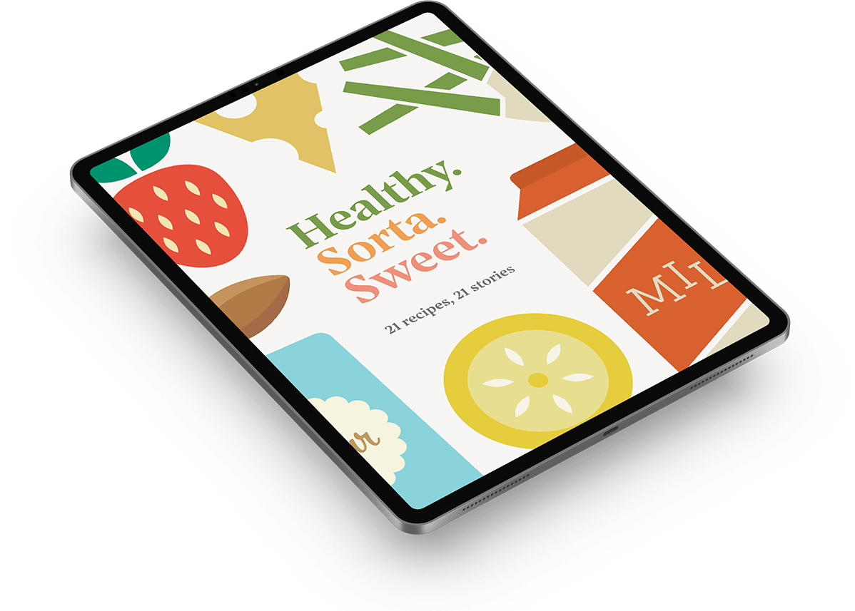 The cover of the Healthy, Sorta, Sweet Cookbook set against a red background
